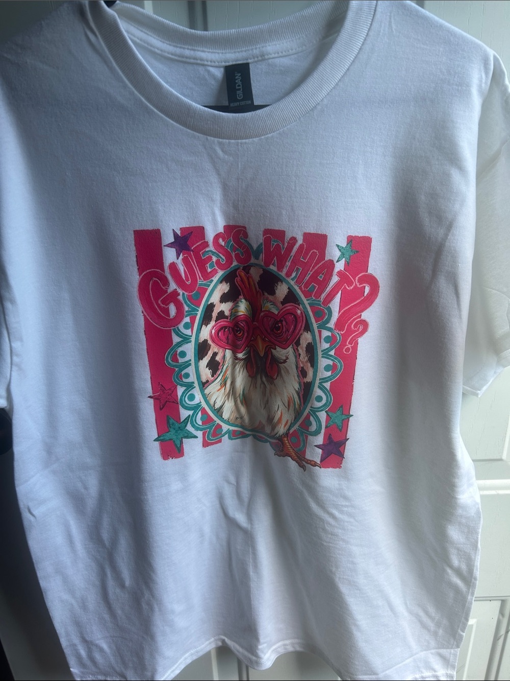 White Graphic T‑Shirt with Pink & Teal Rooster Design